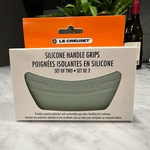 Le Creuset silicone handle grips / pot holders in sea salt. Set of two.